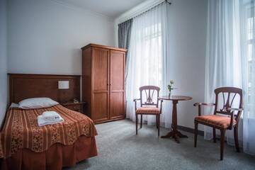 Фото номера Стандартный одноместный номер Отель Hotel Pod Złotą Różą г. Кельце 2