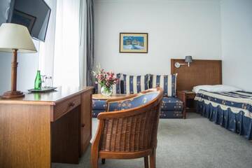 Фото номера Одноместный номер «Премиум» Отель Hotel Pod Złotą Różą г. Кельце 2