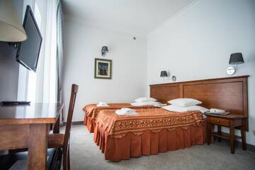 Фото номера Двухместный номер «Премиум» с 1 кроватью Отель Hotel Pod Złotą Różą г. Кельце 6