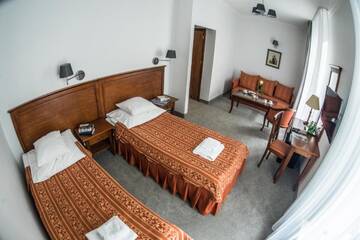 Фото номера Двухместный номер «Премиум» с 1 кроватью Отель Hotel Pod Złotą Różą г. Кельце 3