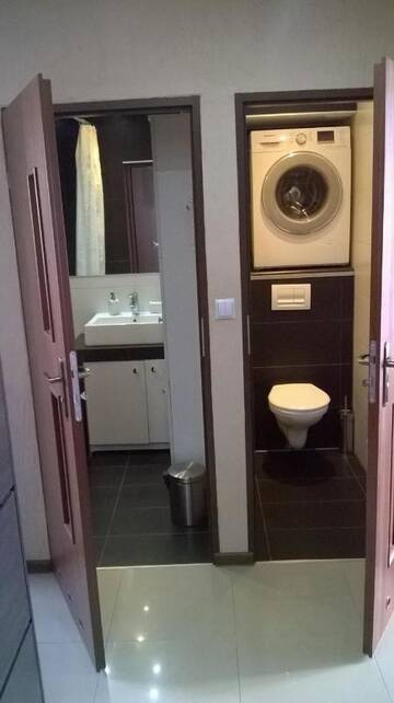 Фото номера Апартаменты с 3 спальнями Апартаменты Apartament Sandra г. Кельце 9