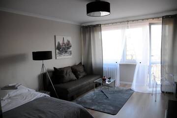 Фото номера Апартаменты с 2 спальнями Апартаменты Apartament Kiza г. Кельце 80