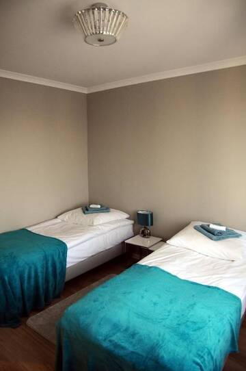 Фото номера Апартаменты с 2 спальнями Апартаменты Apartament Kiza г. Кельце 52