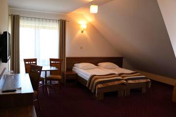 Фото номера Трехместный номер Отель Hotel DYMINY г. Кельце 5