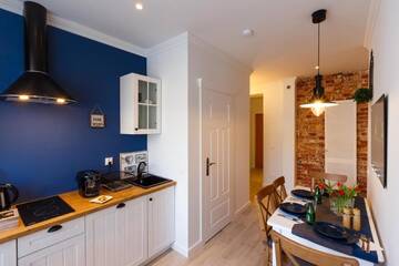 Фото номера Улучшенные апартаменты Апартаменты Apartamenty Sienkiewicza г. Кельце 9