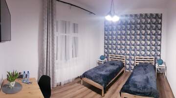 Фото номера Двухместный номер с 1 кроватью Проживание в семье Guest Room RÓWNA г. Кельце 2