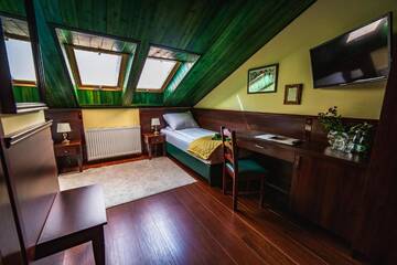 Фото номера Двухместный номер с 1 кроватью Проживание в семье Shoemaker Irish Pub &amp; Accommodation г. Кельце 7