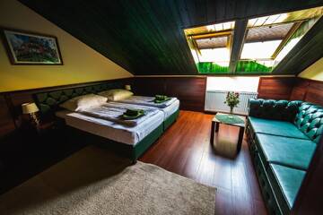 Фото номера Номер-студио с диваном-кроватью Проживание в семье Shoemaker Irish Pub &amp; Accommodation г. Кельце 6