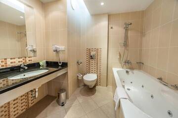 Фото номера Апартаменты с 1 спальней Отель Qubus Hotel Kielce г. Кельце 5